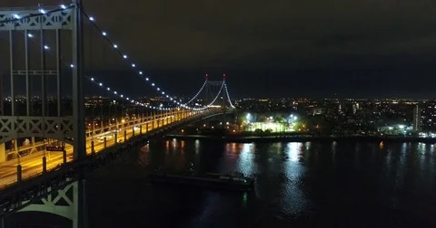 RFK Bridge Lit Gold over the East River at Night Stock-Footage 75399048