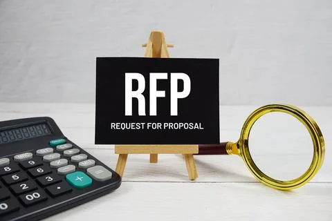 RFP abbreviation of Request For Proposal text with magnifying glass and cal.. Stockfoto's