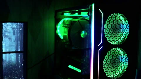 Rgb fan in pc case. Rainbow ropeller for cooling computer components. Gaming pc Stock Footage 166112448