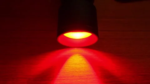 RGB flashlight shines on the table Stock Footage 327073823