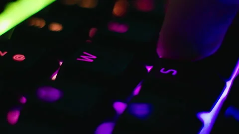 RGB keyboard in macro shoot. Tap on key Stock Footage 146164239