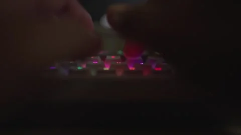 RGB mechanical PC keyboard by hand footage Stock Footage 290946366