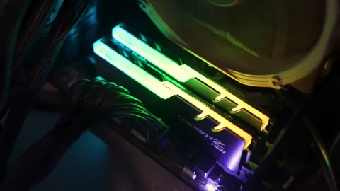 RGB RAM DDR4 Memory illuminating the internal component of gaming computer Stock-Footage 158666196