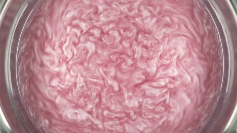 Rheoscopic fluid. Beautiful movement of particles in a liquid. Fantastic Stock Footage 128582389