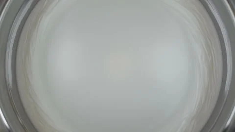 Rheoscopic fluid. Beautiful movement of particles in a liquid. Fantastic Stock Footage 128587514