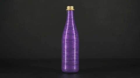 Rheoscopic liquid inside glass bottle on black background.Violet. 動画素材 252033057