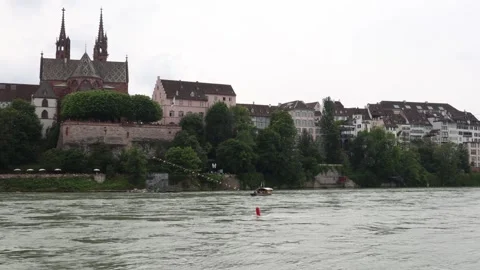Rhine ferry crossing the river in Basel below Munster Video stock 277544903