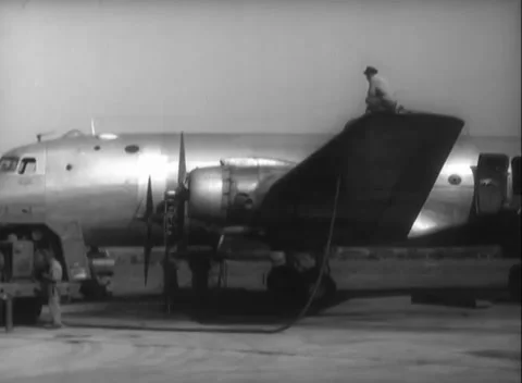 RHINE-MAIN, GERMANY - 1948: C-54 airlift loading - Crew loads crated cargo Stock Footage 344491833