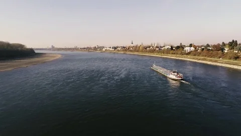 Rhine river and a barge 스톡 동영상 100560341