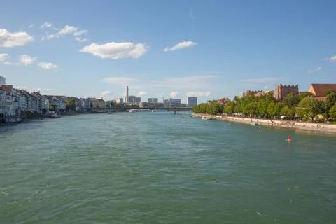 Rhine River flow through Basel Old Town, urban section riverside panorama Stock Photos