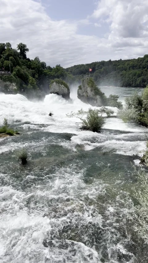 Rhine river flowing through swiss alpine valley scenic landscape Stock Footage 334327568