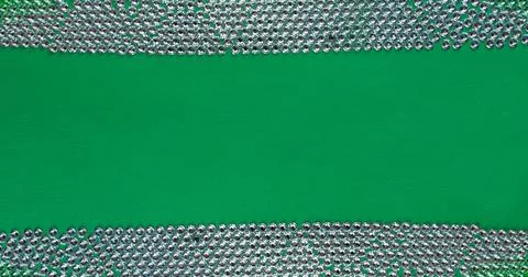 Rhinestones on a green background, top photo. design for text Stock Illustration
