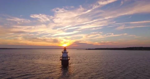 Rhode Island lighthouse at sunset 4K aerial video 動画素材 58484067