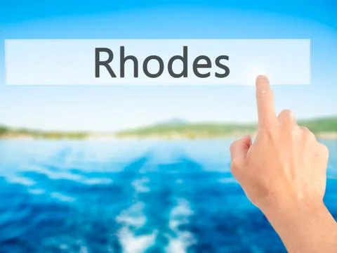 Rhodes - Hand pressing a button on blurred background concept on visual scree Stock Photos