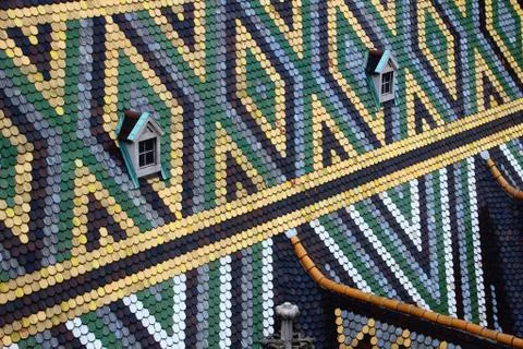 Rhombus and triangle pattern colorful tiles Stephansdom Vienna Stock Photos