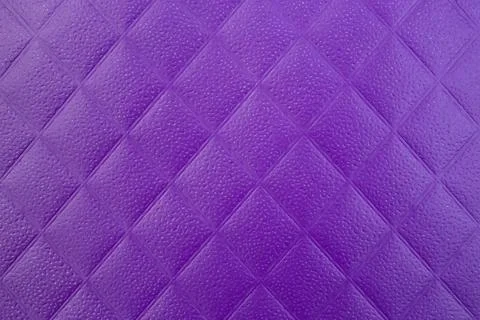 Rhombus pattern plastic texture, full frame purple diamond shape backdrop Stock Photos