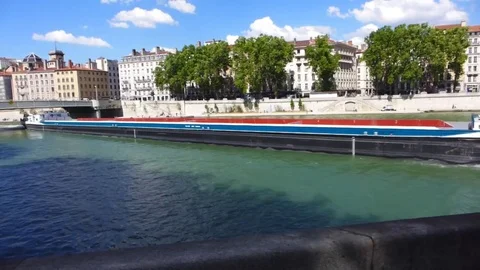 Rhone River at Lyon with long barge Stock Footage 84808348