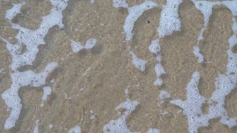 The rhythm of waves on the beautiful beach. Close up shot 4K Stock Footage 123402299