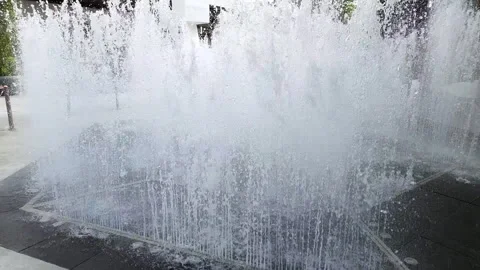 Rhythmic cascading patterns of waters shooting up and going down in a Stock Footage 257682770