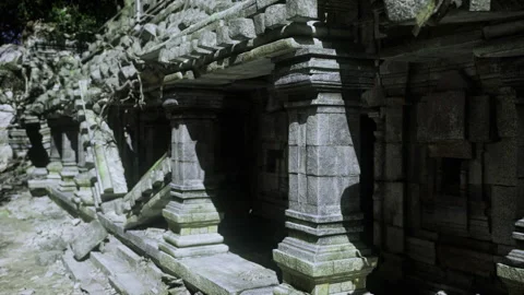 Rhythmic columns and narrow sunlight streams create dramatic effects Stock Footage 341567316