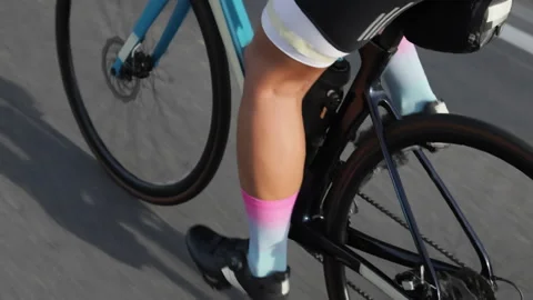 Rhythmic motion of legs pedaling a bicycle. Stock Footage 284918240
