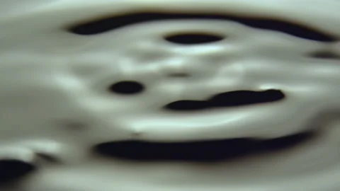 Rhythmic oscillations of water from fresh summer rain Stock Footage 237170254
