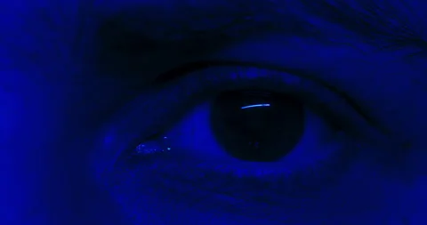 Rhythmically pulsating blue and red led laser light. Macro close-up on the man's Stock Footage 229269103