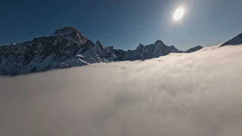 Rial FPV Cloud Surfing Winter Wonderland Breath TakingScenery, 4K Stock Footage 323465629
