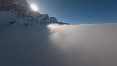 Rial FPV Cloud Surfing Winter Wonderland Beautiful Scenery, 4K Stock Footage 323465634
