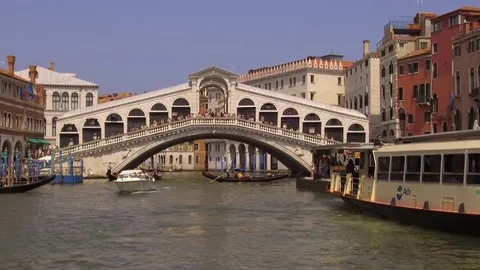 The Rialto Bridge and Gondolas from the middle of the Grand Canal, Venice Ita Stock Footage 83322957