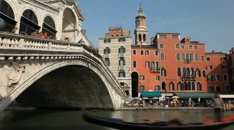 Rialto Bridge in Venice, Italy, people, boats, ships and gondolas time lapse Stock Footage
