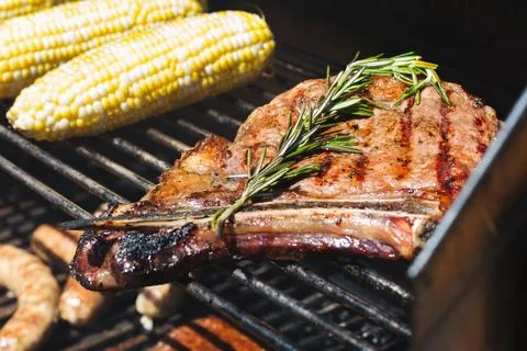 Rib eye steak on bbq Stock Photos