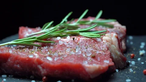 Rib Eye Steak on dark background Stock Footage 118185561