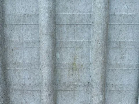 Ribbed concrete wall surface Stock Photos