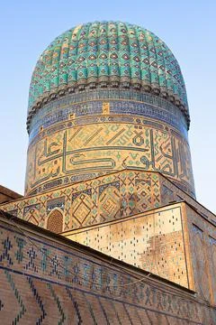 Ribbed turquoise dome of Bibi-Khanym Mosque in Samarkand featuring intricat.. Фото