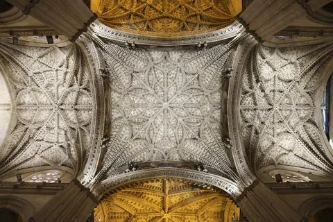Ribbed vault ceiling of The Cathedral of Seville city Stock Photos