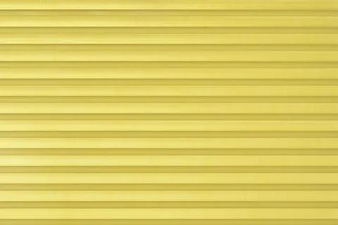 Ribbed yellow plastic texture macro Stock Photos