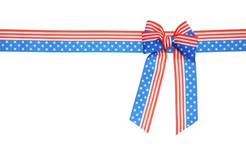 Ribbon bow with American flag pattern isolated on white, top view Stock Photos
