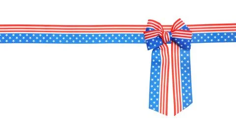Ribbon bow with American flag pattern isolated on white, top view Stock Photos