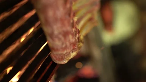 Ribs are cooking over the flames on the grill - Vertical Stock Footage 181041311