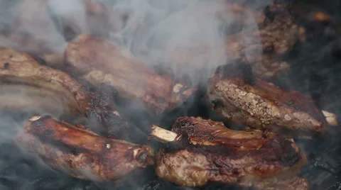 Ribs on barbecue grill Stock Footage 37857126