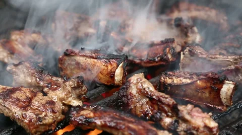 Ribs on barbecue grill Stock Footage 37857157