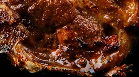 Ribs on black plate Vídeos de archivo 21935379