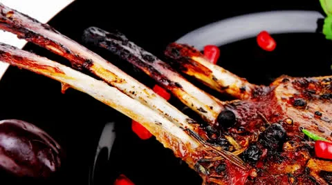 Ribs on black plate 動画素材 24828254