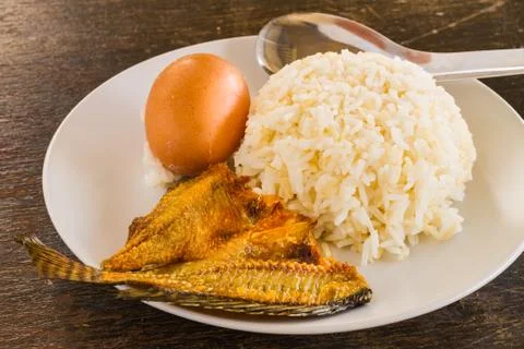 Rice and dried fish Stock Photos