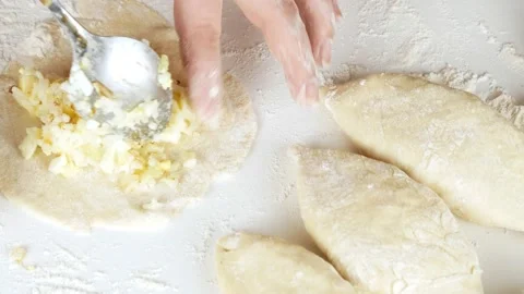 Rice and Egg Pie. Cooking pastries and pies. Russian and Ukrainian cuisine. 스톡 동영상 148336532