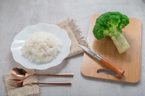 Rice and vegetable broccoli on white background healthy vegetarian food con.. Stock Photos