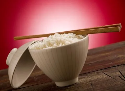 Rice with asian chopstick Stock Photos