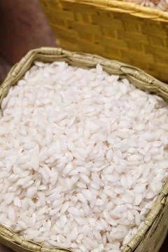 Rice in baskets Stock Photos
