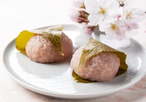 Rice cake with bean paste wrapped in a preserved cherry leaf Stock Photos